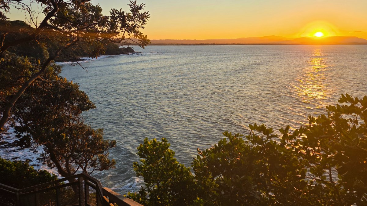 Sunset across the coast at Byron Bay