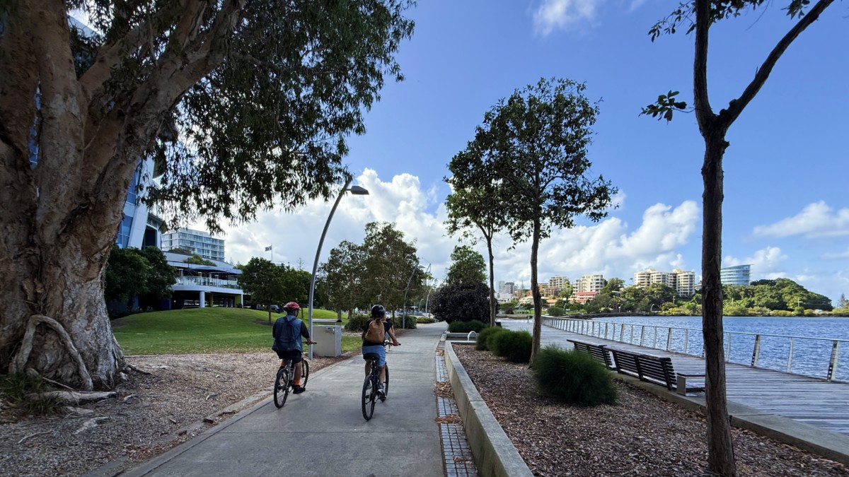 Cycling beside the waterfront at Tweed Heads, New South Wales