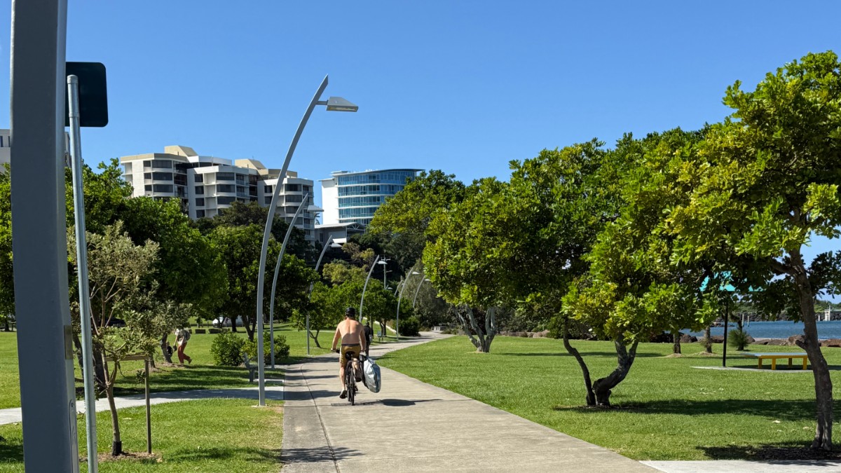 Ebike rider on the shared path beside the Tweed River in Tweed Heads