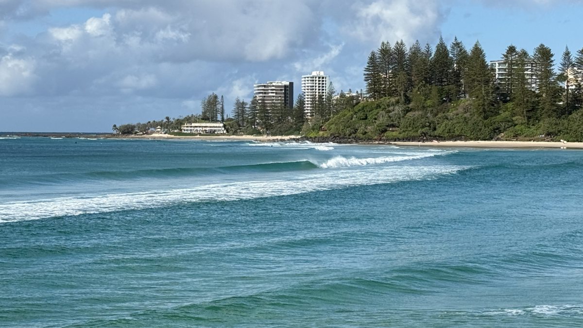 Ocean waves at Rainbow Bay looking towards Greenmount on the southern Gold Coast